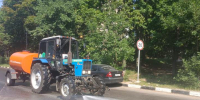 Коммунальщики поливают раскаленные дороги Дзержинского: на термометрах выше +30 - Regions.Ru